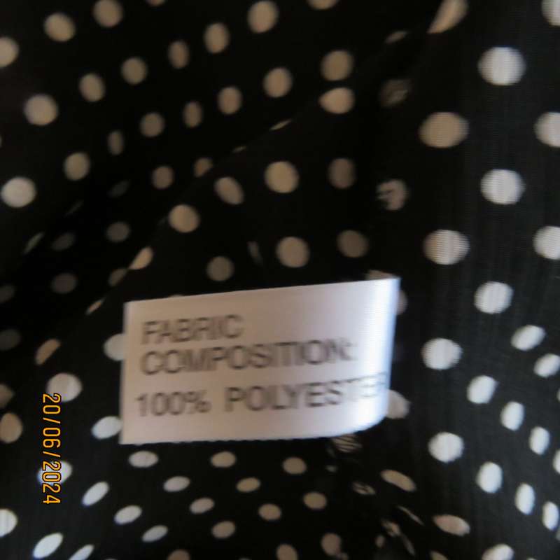 Beautiful versatile black/white polka dot textured polyester short sleeve top V neck.Size 42.New con
