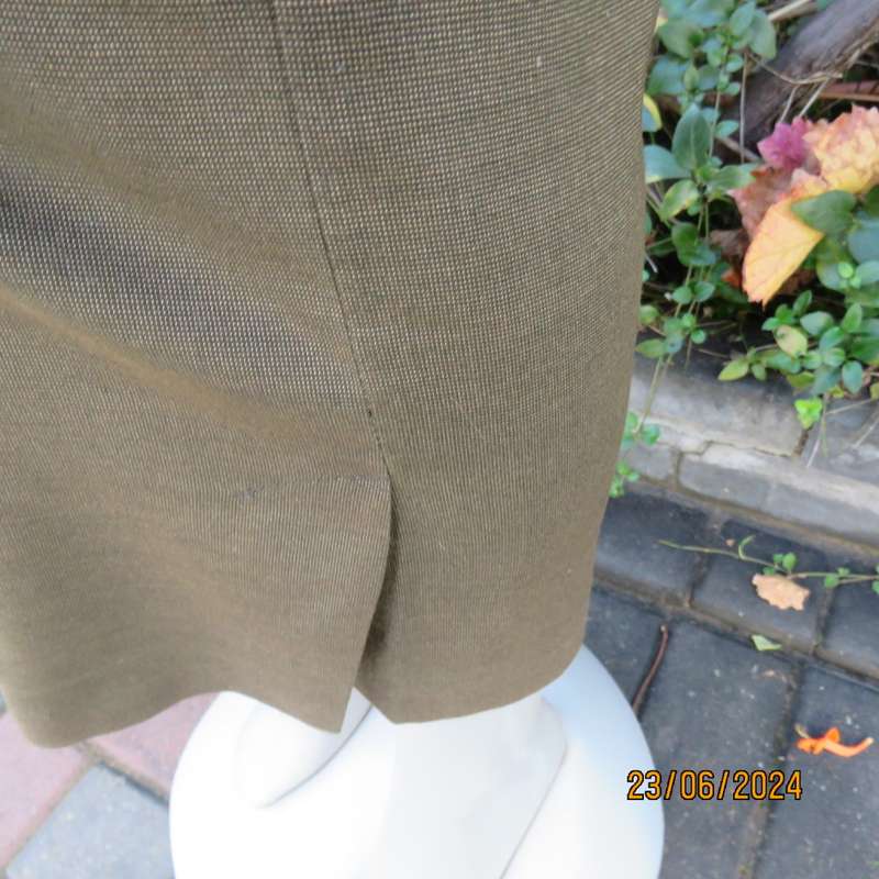 Mottled olive green ankle length pants by MERIEN HALL size 38. Slits at outer leg seams. As new