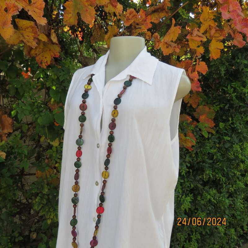 Snow white long button down creased cotton button down top with open collar. Size 40. New cond.