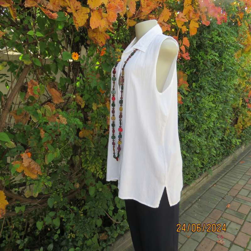 Snow white long button down creased cotton button down top with open collar. Size 40. New cond.