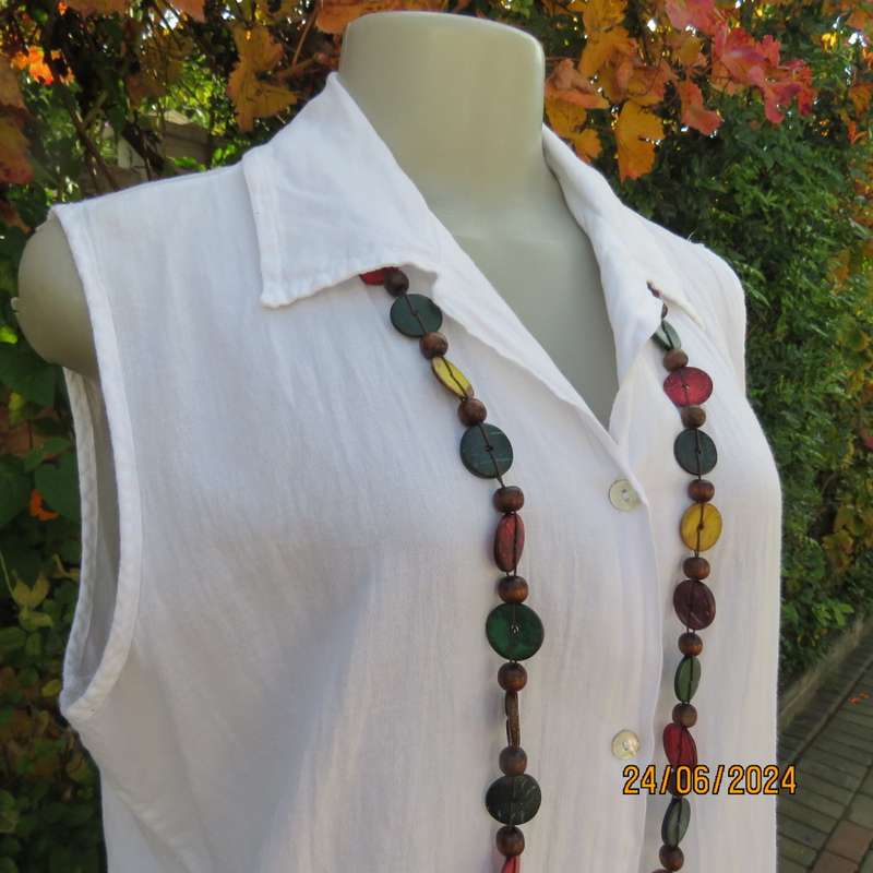 Snow white long button down creased cotton button down top with open collar. Size 40. New cond.