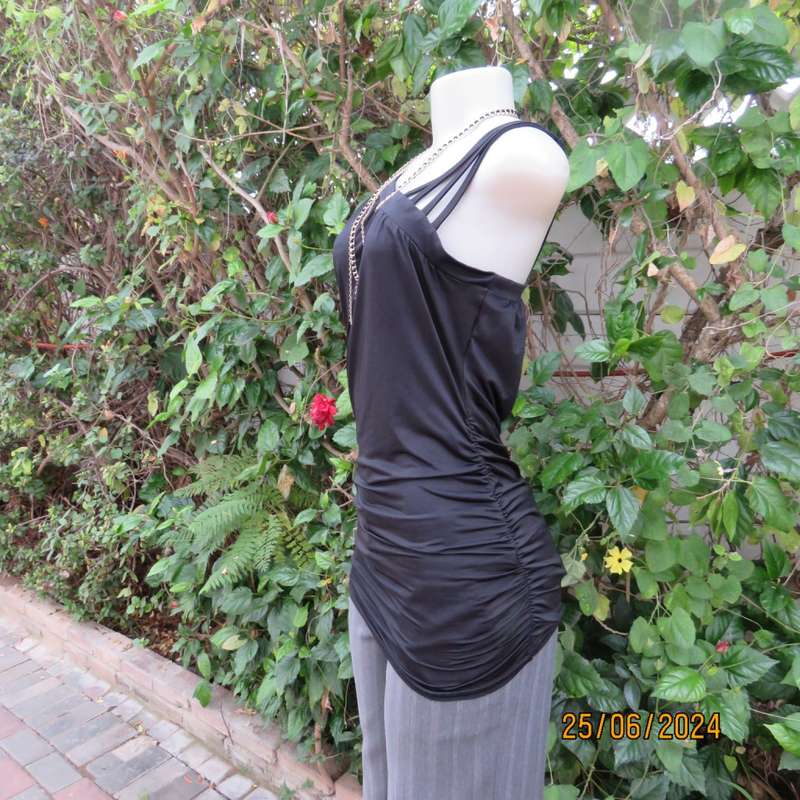 Amazing black poly stretch long top. One short cut-on sleeve/and 3 thin shoulder straps.Size 36 WWW