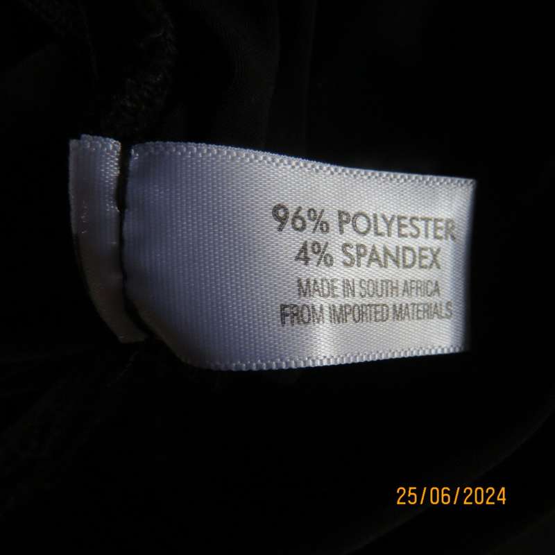 Amazing black poly stretch long top. One short cut-on sleeve/and 3 thin shoulder straps.Size 36 WWW