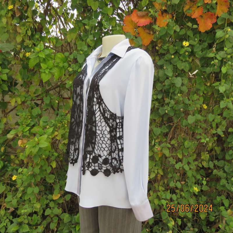 Chic black cotton lace/netting open waistcoat to give oemph to a garment. Size 36/38. New cond.