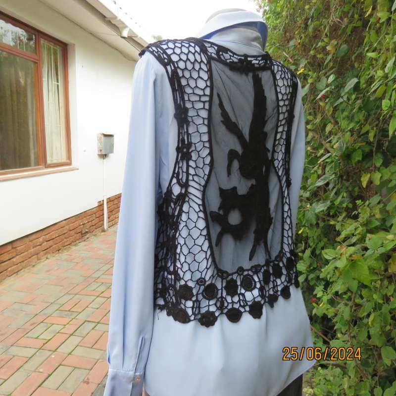 Chic black cotton lace/netting open waistcoat to give oemph to a garment. Size 36/38. New cond.