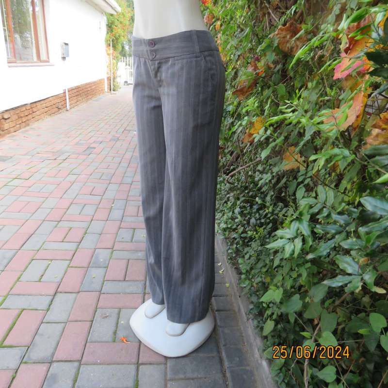 Elegant grey elongating striped rayon/poly stretch straight legged pants. Size 36. Side pockets.