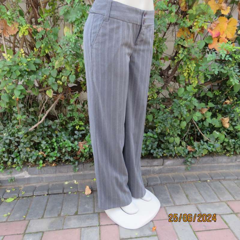 Elegant grey elongating striped rayon/poly stretch straight legged pants. Size 36. Side pockets.