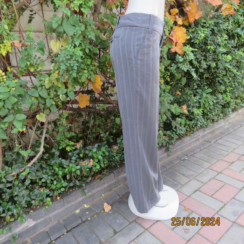 Elegant grey elongating striped rayon/poly stretch straight legged pants. Size 36. Side pockets.