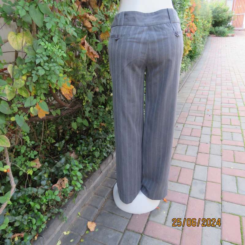 Elegant grey elongating striped rayon/poly stretch straight legged pants. Size 36. Side pockets.