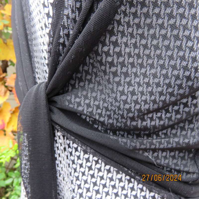 Handy crossover sheer polyester black bolero. Long straps to tie, Tiny lace capped sleeves. Size 38