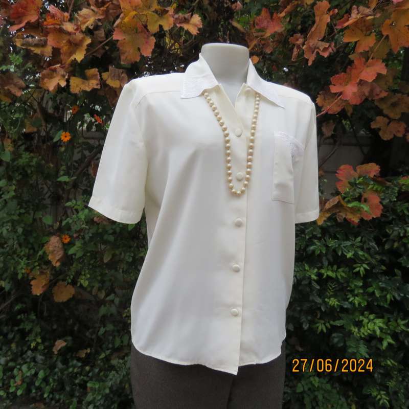 Amazing cream short sleeve blouse with embroidered shirt collar and pocket.By CANDA from UK size 36