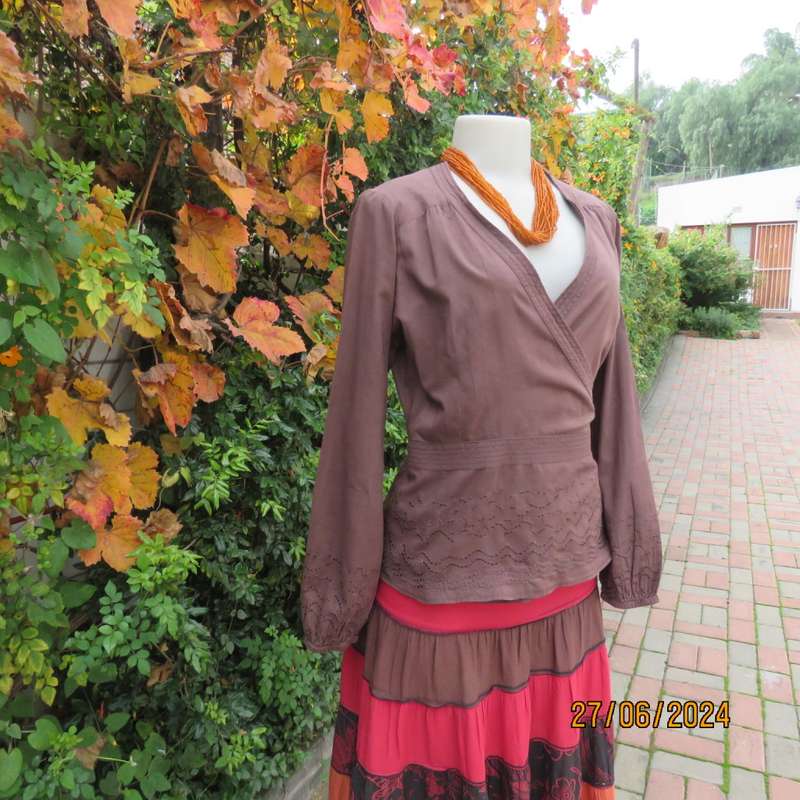 Attractive med brown fold over peplum long sleeve top by SPIRIT from IRELAND. Size 37.Embroidered.