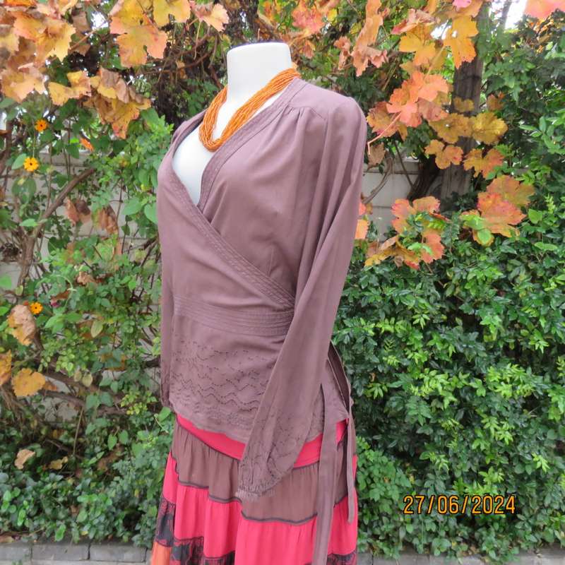 Attractive med brown fold over peplum long sleeve top by SPIRIT from IRELAND. Size 37.Embroidered.