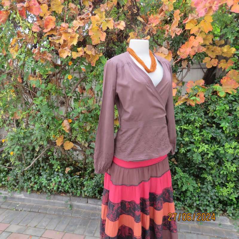 Attractive med brown fold over peplum long sleeve top by SPIRIT from IRELAND. Size 37.Embroidered.