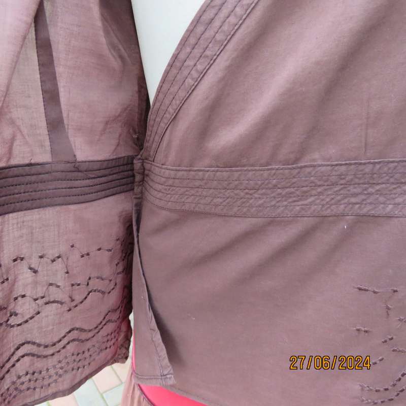 Attractive med brown fold over peplum long sleeve top by SPIRIT from IRELAND. Size 37.Embroidered.