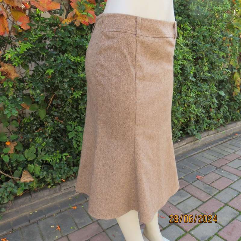 Top of the line winter poly/wool blend trumpet style skirt by`FASHION EXPRESS in 34/10.As new.