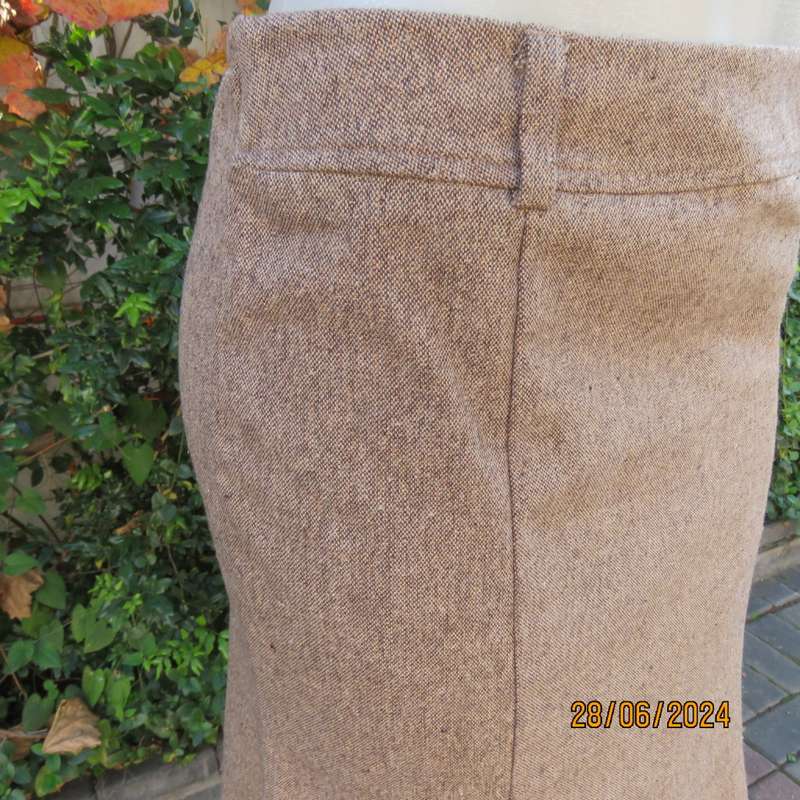 Top of the line winter poly/wool blend trumpet style skirt by`FASHION EXPRESS in 34/10.As new.