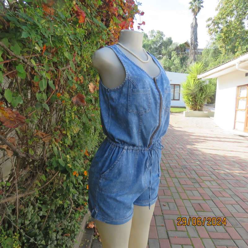 Sexy blue denim romper suit size 34 by NEW FEELING. Polycotton. With 6 pockets.Drawstring waist.