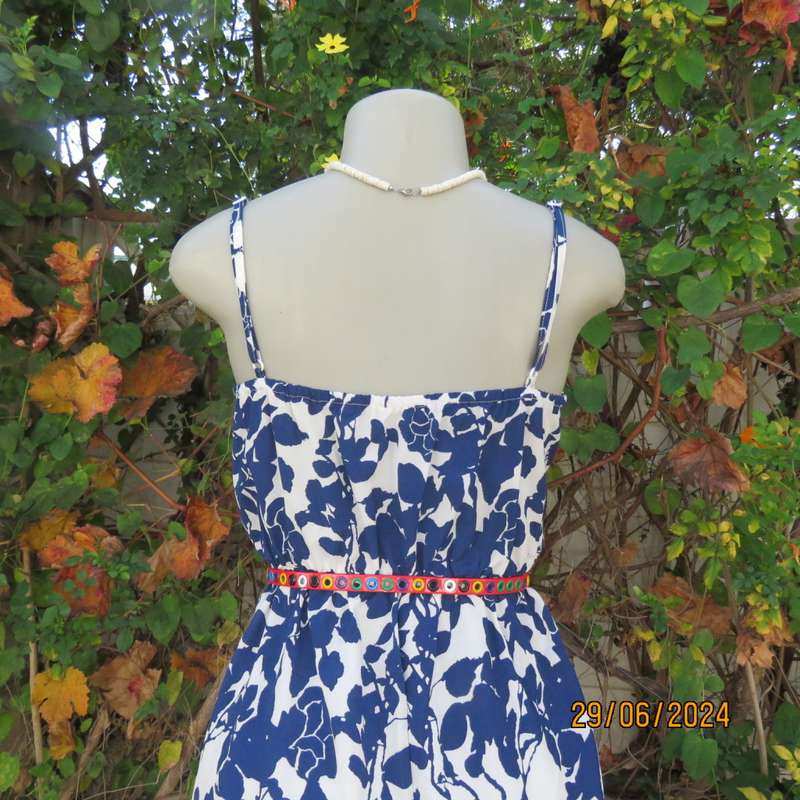 Summer romper in white with bold navy flowers. Elasticated waist. Size 36 by SHEIN. Brand new cond.