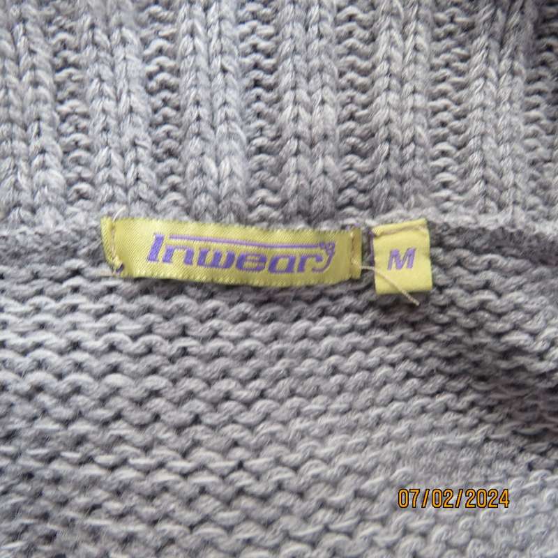 Double knit grey acrylic cardigan. Capped sleeves, button down with wide fold over collar.Size 36.