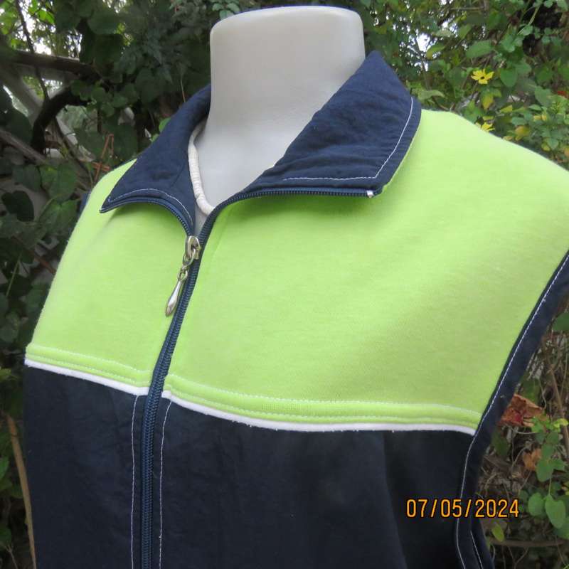 Navy nylon sleeveless zip-up nylon top with lime green front polycotton yoke.Size 42 by ML Classics
