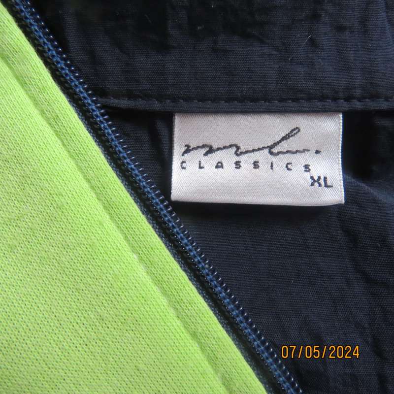 Navy nylon sleeveless zip-up nylon top with lime green front polycotton yoke.Size 42 by ML Classics