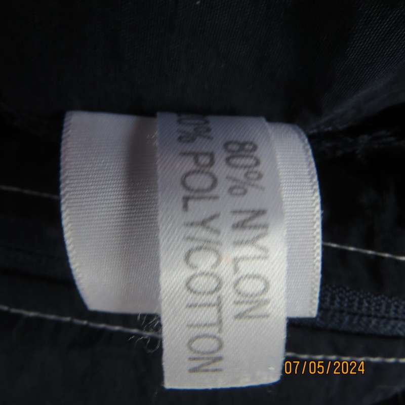 Navy nylon sleeveless zip-up nylon top with lime green front polycotton yoke.Size 42 by ML Classics