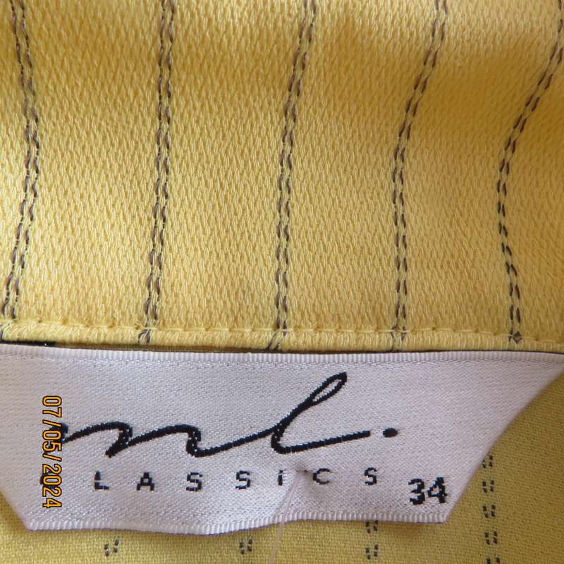 Elegant light yellow jacket with thin black stripes by ML Classics size 34/10. 4 button close.As new