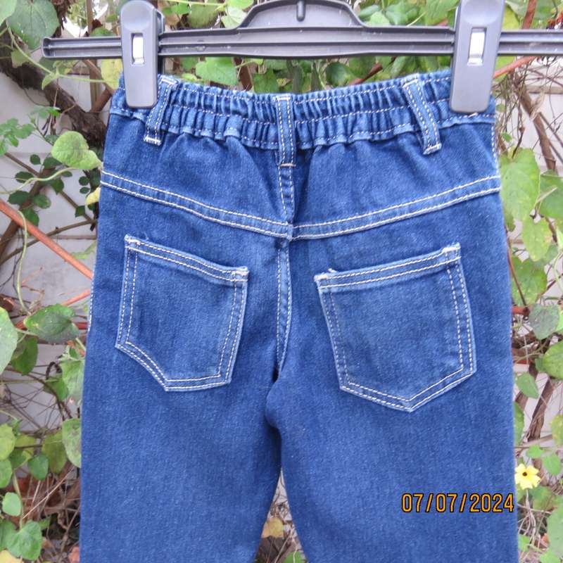 Cute denim blue jeans by DUDE for boys 5 to 6yrs old. Skinny legs.Polycotton stretch. As new.