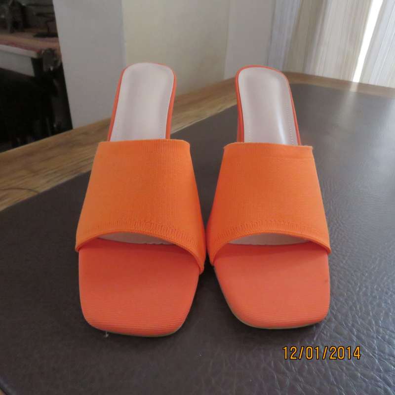 Stunning high quality papaya colour heel sandals by CUCCOO size 7. Brand new. Never worn.Wrong size.