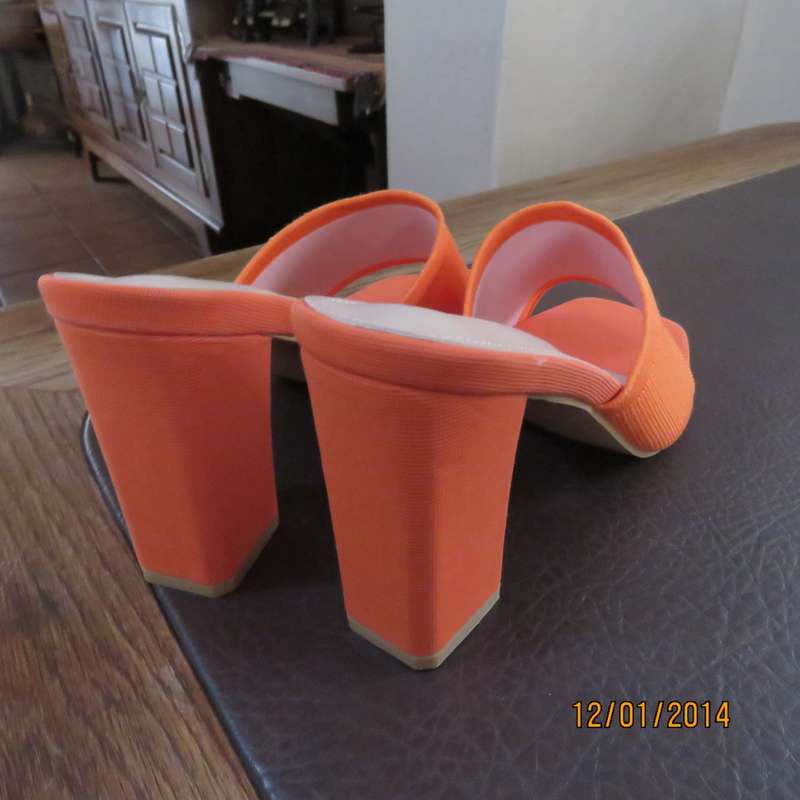 Stunning high quality papaya colour heel sandals by CUCCOO size 7. Brand new. Never worn.Wrong size.