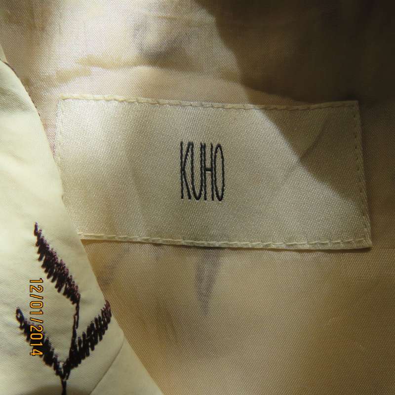 Absolute amazing short poly/nylon lined button down cream jacket. Richly embroidered. Size 33 KUHO.
