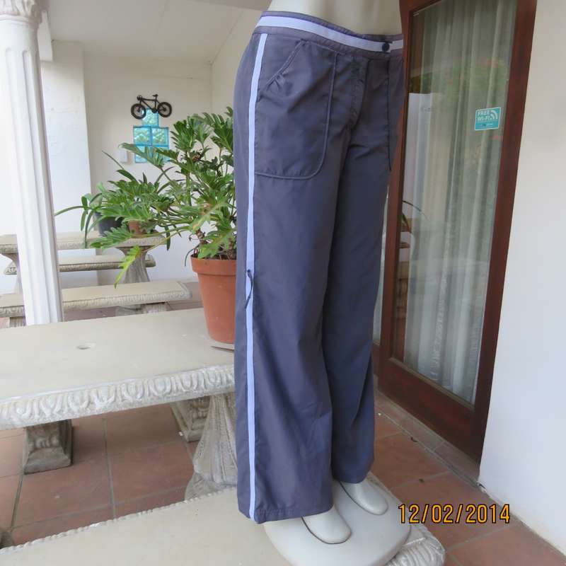 FUSION high quality grey polyester fitness pants. Blue bands at leg sides and front. Size 36.As new.