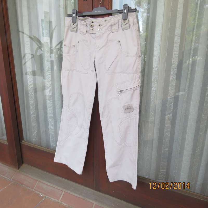 Fashion beige 100% cotton URBAN - Hilton Wiener pants. Size 34.With 5 pockets.Many studs. As new.