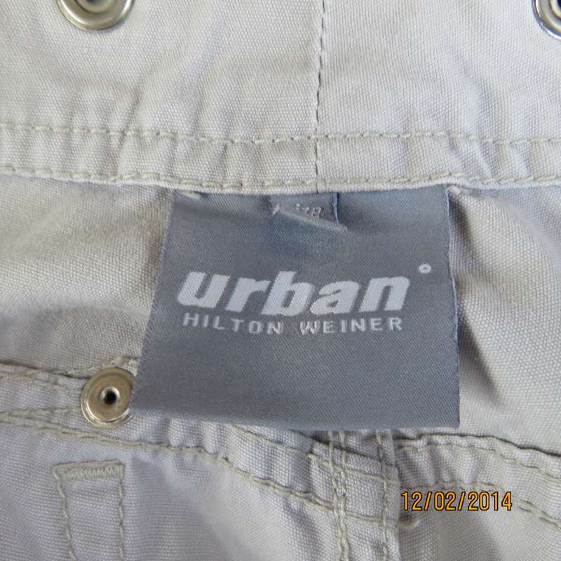Fashion beige 100% cotton URBAN - Hilton Wiener pants. Size 34.With 5 pockets.Many studs. As new.