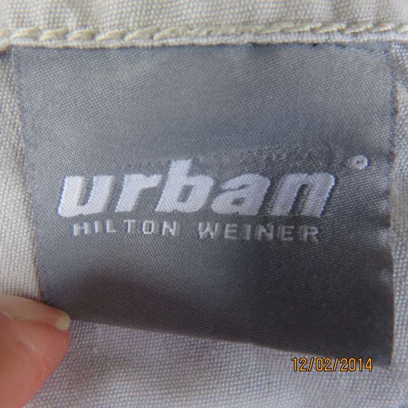 Fashion beige 100% cotton URBAN - Hilton Wiener pants. Size 34.With 5 pockets.Many studs. As new.