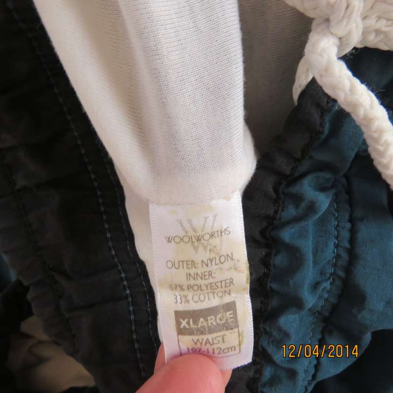 Men's dark jade tracksuit pants in nylon with polycotton stretch inner. Drawstring waist.Size XL.