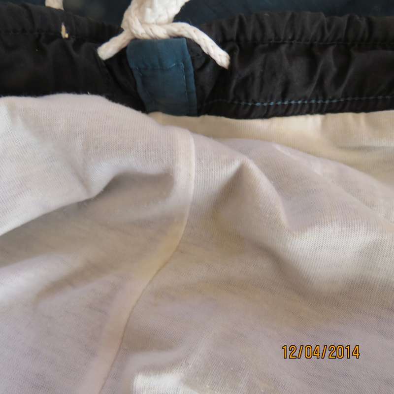 Men's dark jade tracksuit pants in nylon with polycotton stretch inner. Drawstring waist.Size XL.