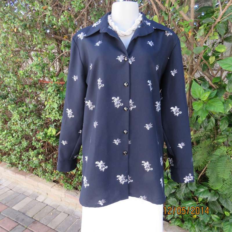 Amazing very dark navy with grey floral embroidery long sleeve top. Size 42.Brand new cond.