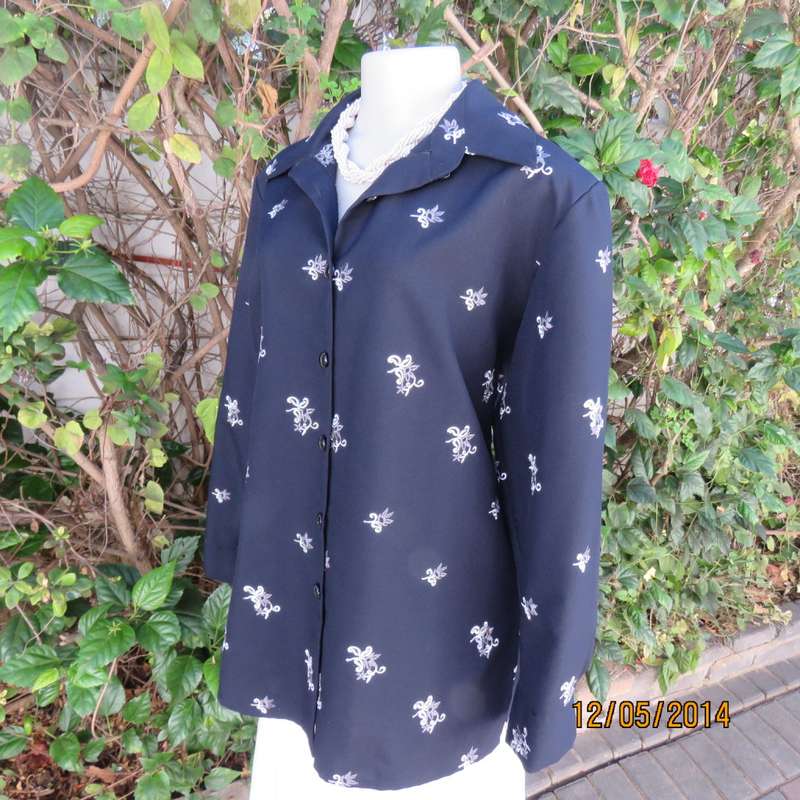 Amazing very dark navy with grey floral embroidery long sleeve top. Size 42.Brand new cond.