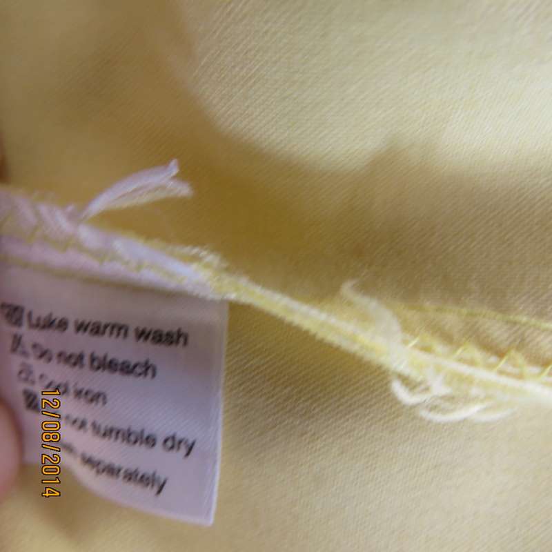 Pretty buttercup yellow short sleeve top with button down/open collar.Size 36. Brand new cond.