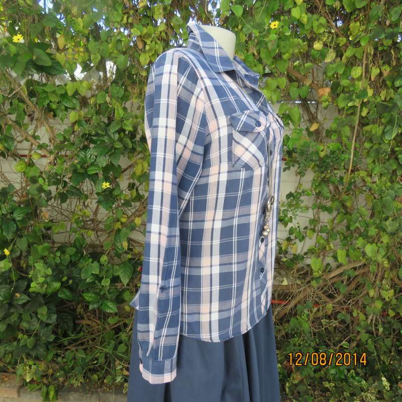 Casual long sleeve check button down top in blues.Peach touches. Two pockets.By IDENTITY.Size 36.