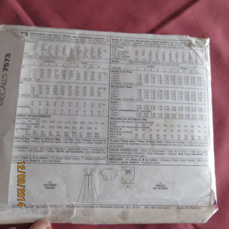 Sewing pattern for girls special dress with bolero and bow. McCALLS 7573. Age 2 to 14. Complete.