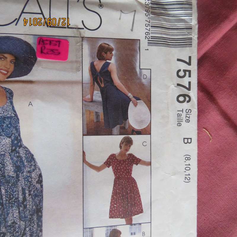 Sewing pattern for dress with amazing back detail by McCalls 7576. size 32 to 36. New condition