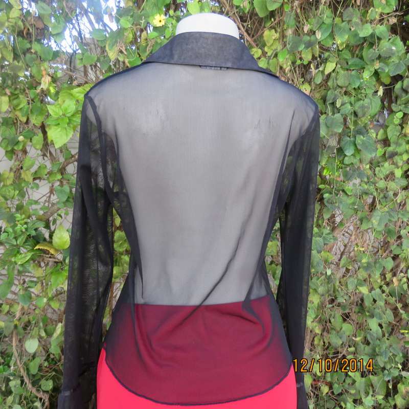 Chic black sheer polyester button down top/open collar. Pretty flare cuffs on sleeves.Size 36.As new