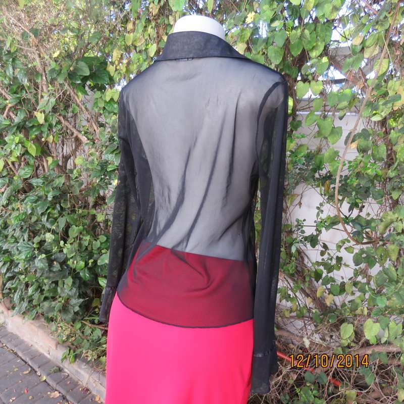 Chic black sheer polyester button down top/open collar. Pretty flare cuffs on sleeves.Size 36.As new