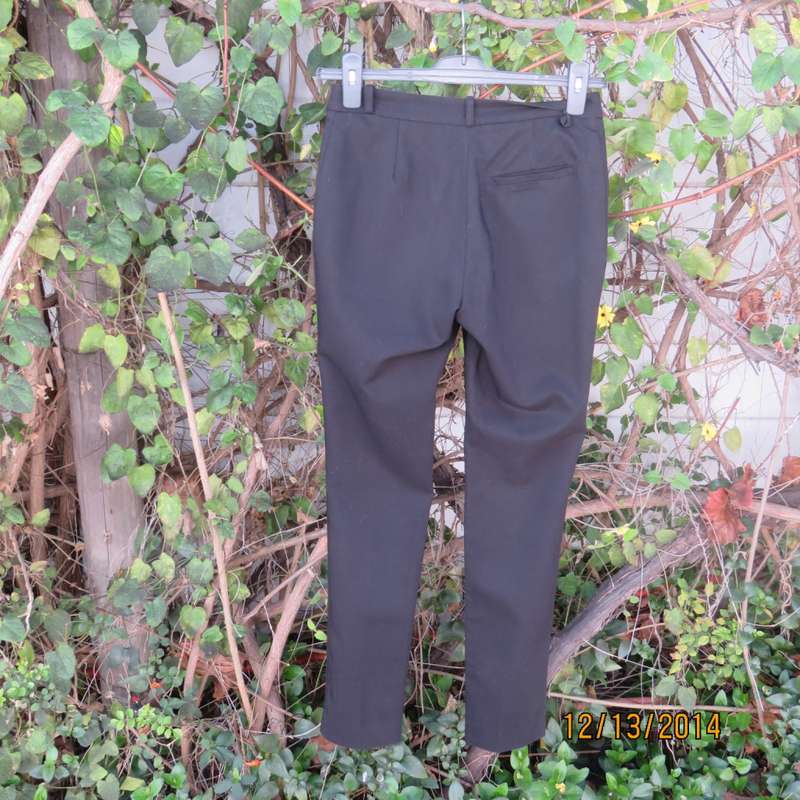 Dream very black skinny pants by H&M size 30. Three slash pockets. Stretch polycotton.Brand new cond