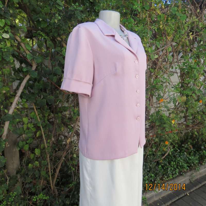 Boutique made lavender short sleeve top/jacket.In vertical textured polyester, Size 37/13. As new