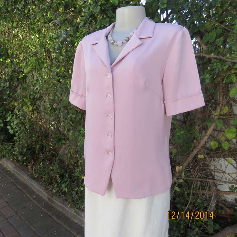 Boutique made lavender short sleeve top/jacket.In vertical textured polyester, Size 37/13. As new