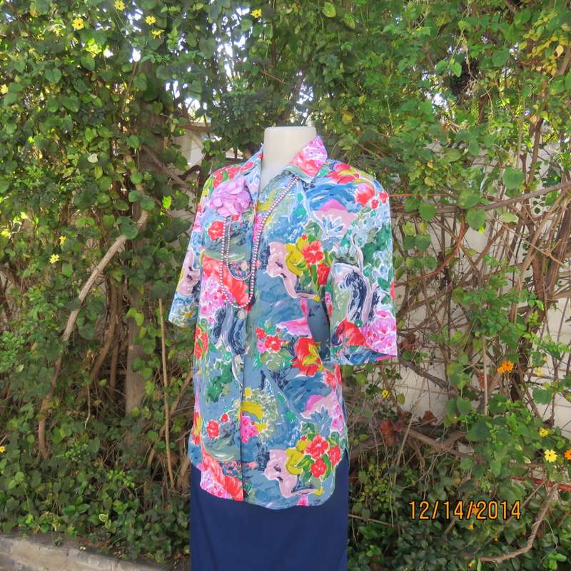 Colouful floral button down top with collar/rounded hems/short sleeves. Size 34 by CONCEPTS.As new